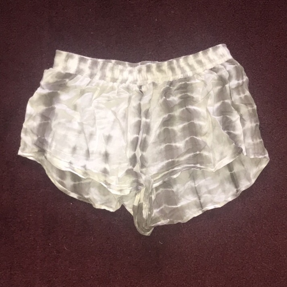 Green and white, Stella laguna beach, shorts.